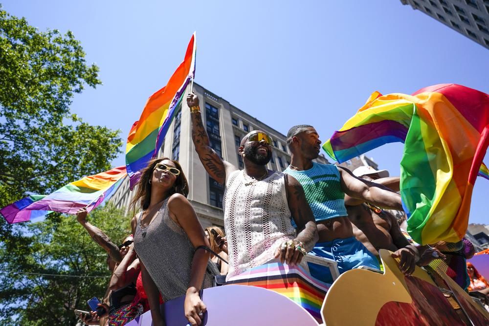 Pride parades march on with new urgency across US