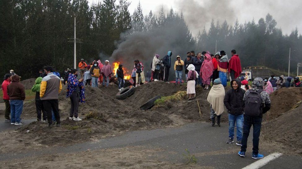 Ecuador protests: Indigenous groups burn tyres and block roads over fuel prices