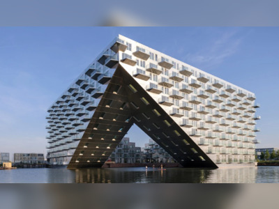 BIG and Barcode Architects unveiled the housing block on the Amsterdam waterfront