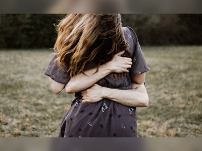Woman Sues Co-Worker, Claims His Extremely Tight Hug Broke Her Ribs