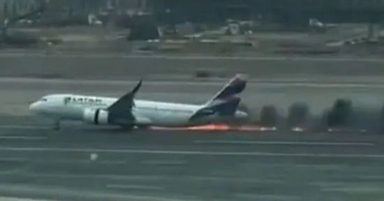 Plane hits vehicle on runway, catches fire at Lima's airport