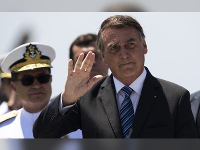 Teary Bolsonaro calls loss unfair, condemns violence, flies to Florida
