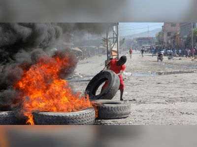 Haiti police block streets, break into airport to protest officer killings