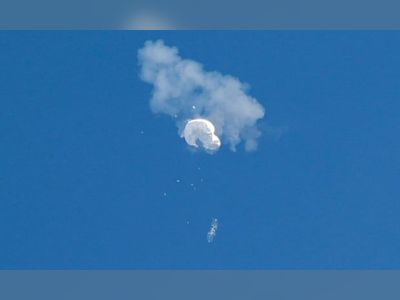War of words over downed Chinese spy balloon continues as US recovers debris