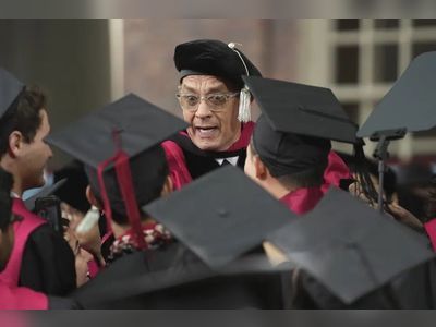 Actor Tom Hanks told Harvard University graduates to be superheroes in their defense of truth and American ideals, and to resist those who twist the truth for their own gain